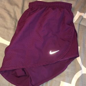Purple Nike shorts